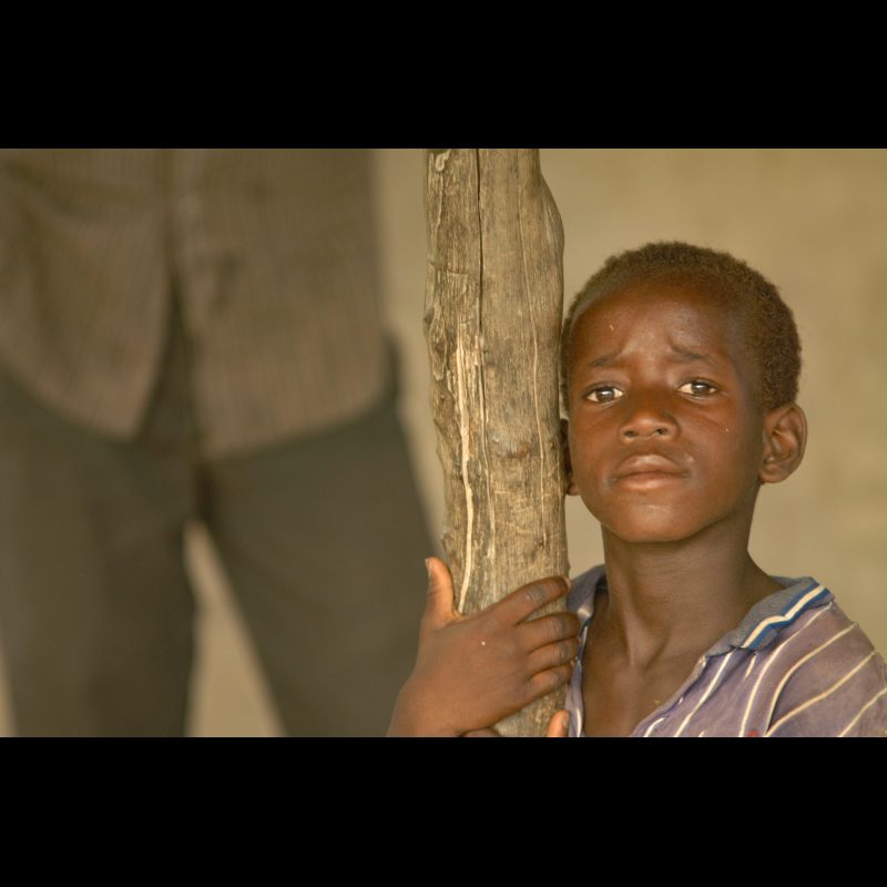 KONADOUGA, Burkina Faso — A young boy stares with wide-eyed curiosity at visiting white people in the village of Konadouga. For many children in this remote Senara community, such encounters are rare and memorable.
