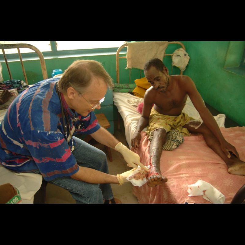 NALERIGU, Ghana Surgeon Danny Crawley makes his early morning rounds at the Baptist Medical Centre in Nalerigu, Ghana, checking on a patients leg wound caused by a snake bite. The hospital treats a wide range of conditions common in the rural regions of northern Ghana.