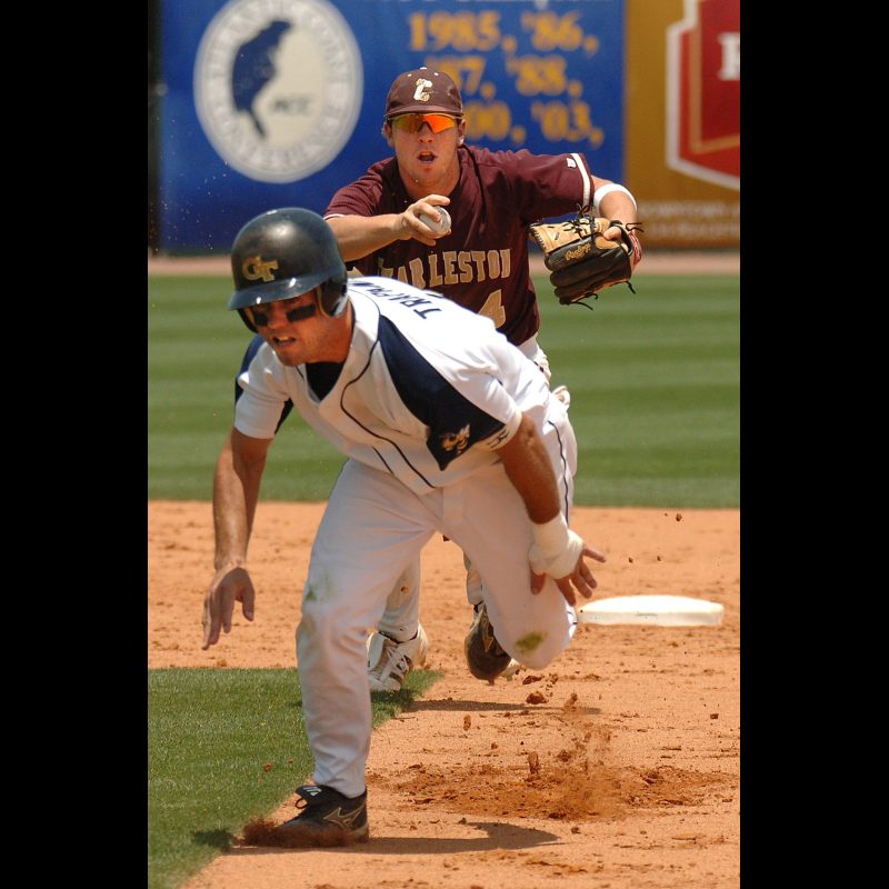 Mike Trapani is chased down by Chris Campbell and finally tagged out by Nick Chigges of the College of Charleston during play at the Russ Chandler Stadium in Atlanta, Georgia, June 9, 2006.