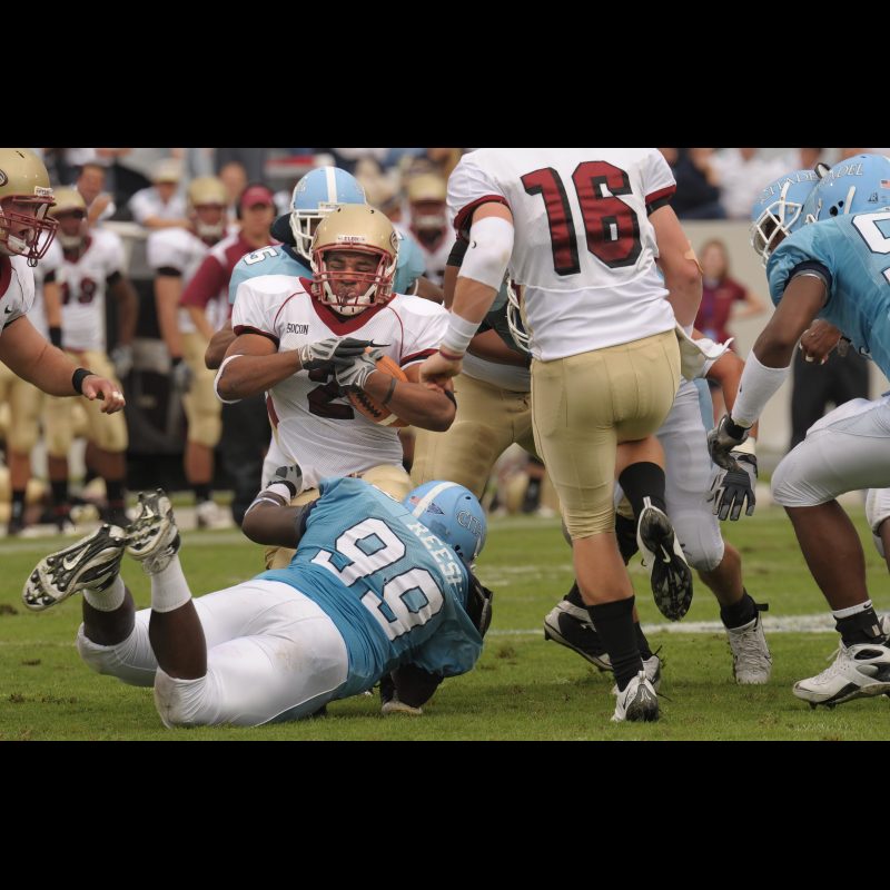 Oct 11, 2008; Charleston, SC, USA; Citadel Bulldog defensive lineman Terrence Reese (99) tackles Elon Phoenix running back Brandon Newsome (2) in the first quarter at Johnson Hagood Stadium.