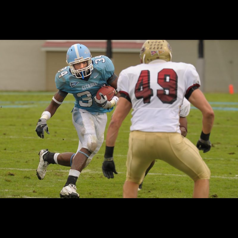 Oct 11, 2008; Charleston, SC, USA; Citadel Bulldog running back Asheton Jordan (34) stares down Elon Phoenix defensive back Walker White (49) during the second quarter at Johnson Hagood Stadium.