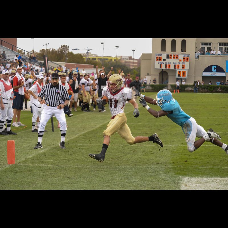 Oct 11, 2008; Charleston, SC, USA; Elon Phoenix wide receiver Bo Williamson (11) scores a touchdown while Citadel Bulldogs defensive back Mel Capers (4) pursues him in the third quarter at Johnson Hagood Stadiumfinal Citadel Bulldogs 23 and Elon Phoenix 27.