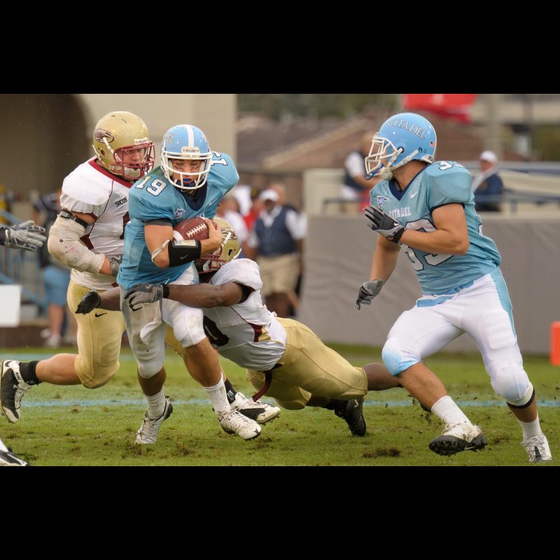 Oct 11, 2008; Charleston, SC, USA; Citadel Bulldogs quarterback Bart Blanchard (19) rushes for no gain before Elon Phoenix linebacker Corey Weaver (10) tackles him in the fourth quarter at Johnson Hagood Stadiumfinal Citadel Bulldogs 23 and Elon Phoenix 27.