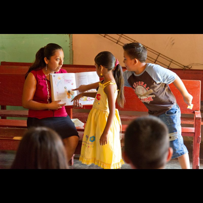 SALVADOR URBINA, Mexico — A woman teaches Sunday School to children at a church in Salvador Urbina, Chiapas, Mexico. Churches in the region play a vital role in community life, offering spiritual guidance and support to families.