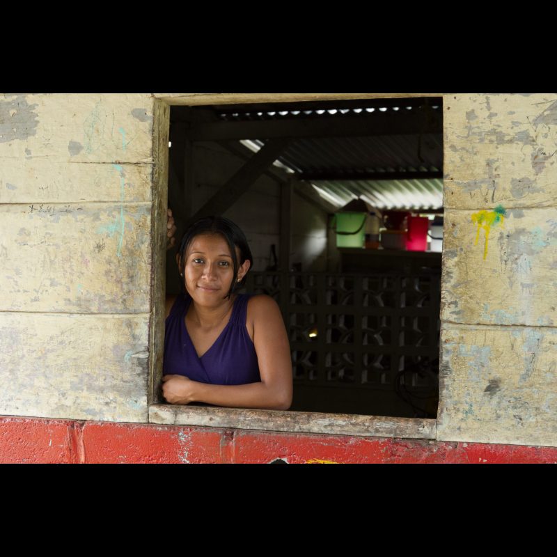 SALVADOR URBINA, Mexico A teenage girl looks out the window of her home in Salvador Urbina, Chiapas, Mexico. Life in this rural coffee-growing community is shaped by strong family connections and daily rhythms rooted in tradition.