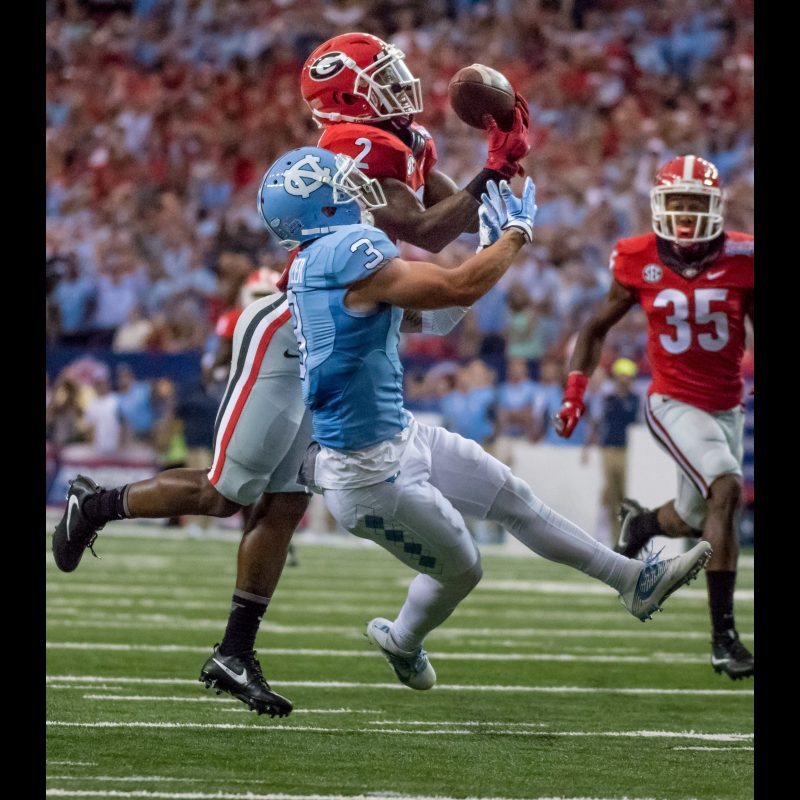 Georgia Bulldog's #2 Defensive Back Maurice Smith breaks up the pass to North Carolina Tarheel's #3 Ryan Switzer in their win over UNC 33 to 24 during the Chick-fil-A Kickoff game at the Georgia Dome on September 3, 2016.