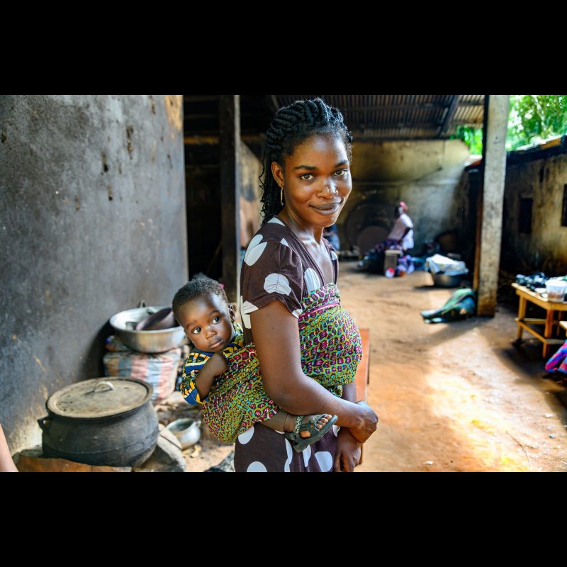 A mother and her little boy are carried in kaitenge. They are staying at the Hôpital Baptiste Biblique in Tsiko, Togo, West Africa.