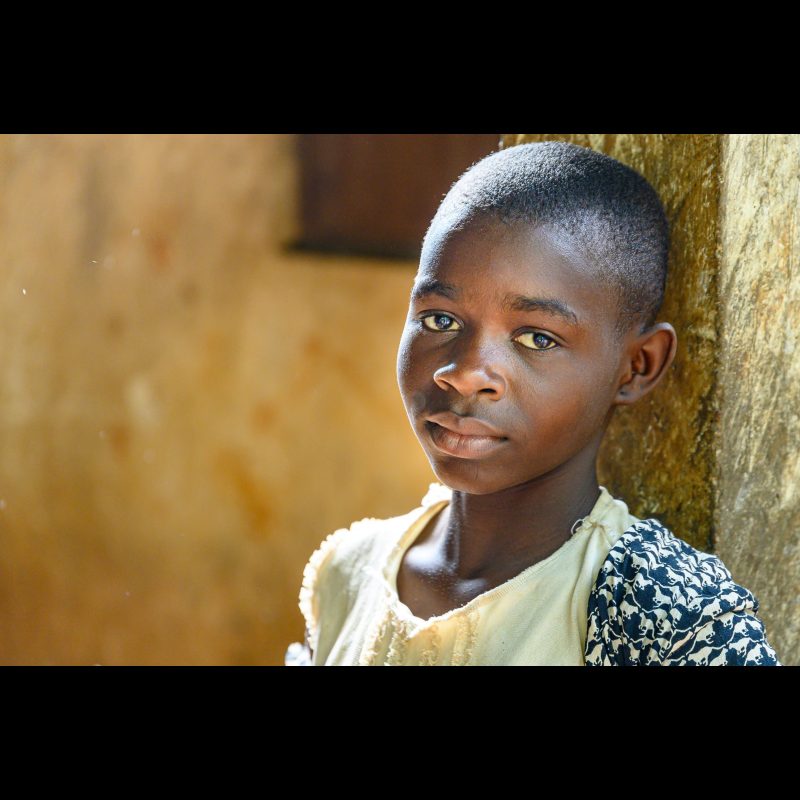The child was fascinated by my camera and watched me as I worked at the Hôpital Baptiste Biblique in Tsiko, Togo, West Africa.